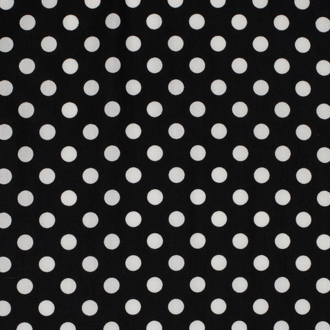 Black fabric with white polka dots