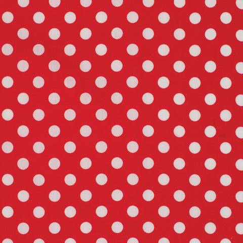 Red fabric with white polka dots