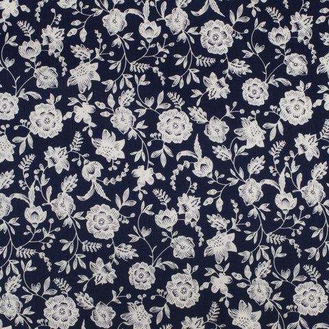Navy blue fabric with white floral pattern