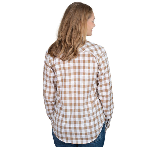 Woman wearing a brown and white checkered shirt on a white background