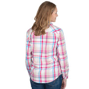 Woman wearing a plaid shirt with pink, blue, and white colors on a white background