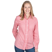 Woman wearing a red checkered shirt on a white background
