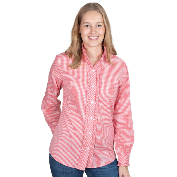Woman wearing a red checkered shirt on a white background