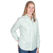 Woman wearing a floral shirt on a white background