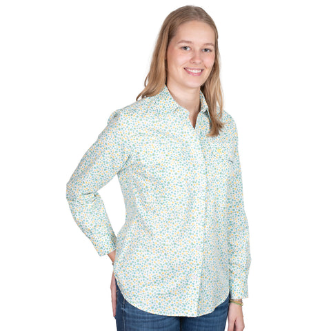 Woman wearing a floral shirt on a white background