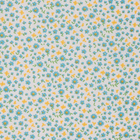Pattern of small blue and yellow flowers on a light blue background