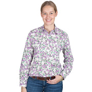 Woman wearing a floral shirt on a white background
