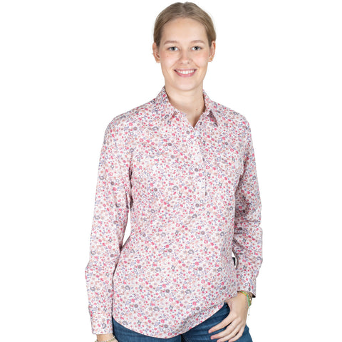 Woman wearing a floral patterned shirt on a white background
