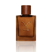 Brown perfume bottle with wooden cap on a white background