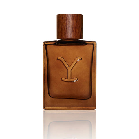 Brown perfume bottle with wooden cap on a white background