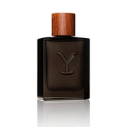 Dark brown perfume bottle with wooden cap on a white background