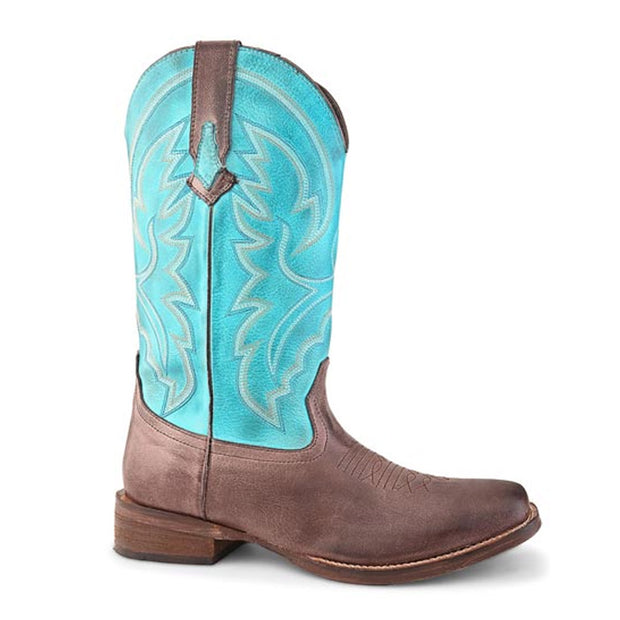 Brown cowboy boot with turquoise inner lining on a white background
