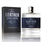 Leather cologne spray bottle and packaging on a white background